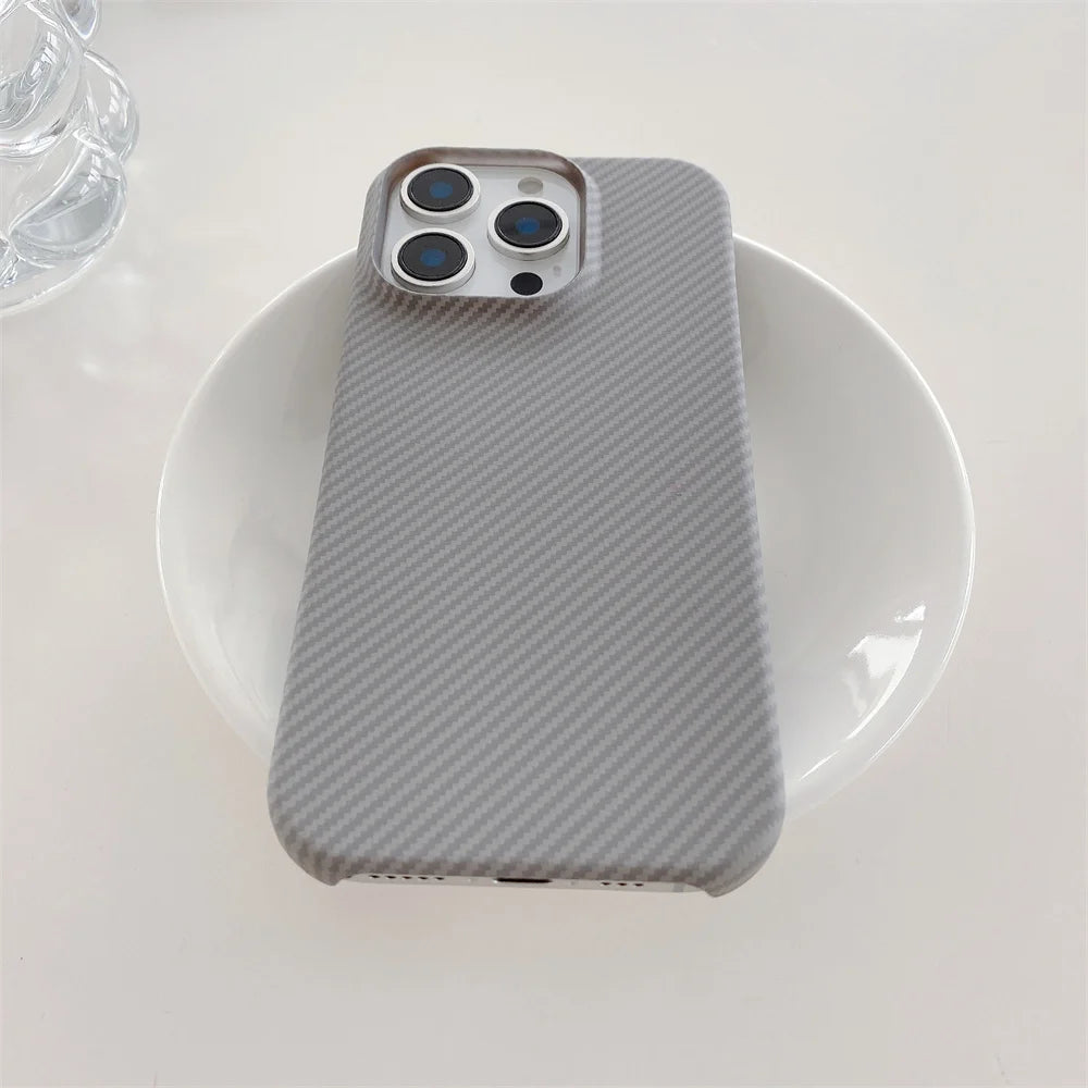 Ultra-Thin Kevlar Aramid Case for your iPhone. MagSafe Ready. Lightweight. Premium Feel.